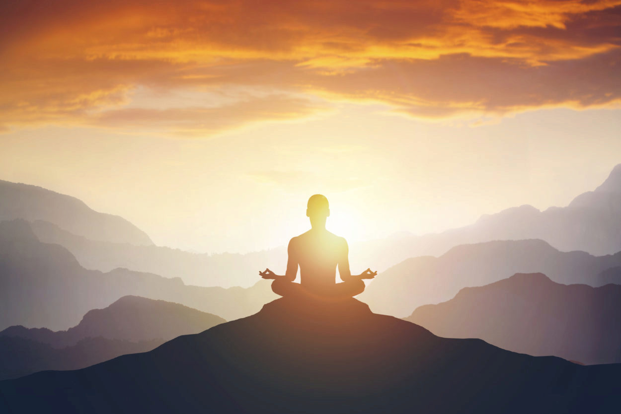 Is Your Mind Your Best Friend Or Your Worst Enemy? silhouette of the meditaion man on the mountain